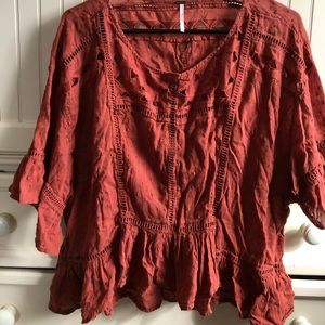 Free people burnt orange blouse
